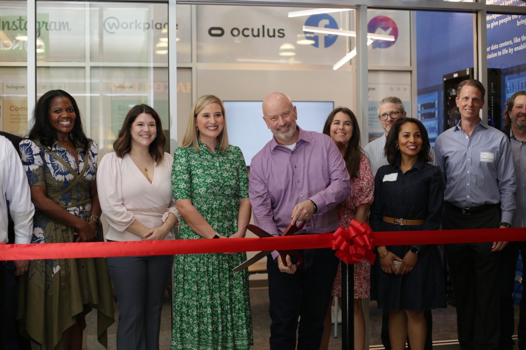 Ribbon cutting at the opening of Meta’s Junior Achievement Center storefront in Georgia