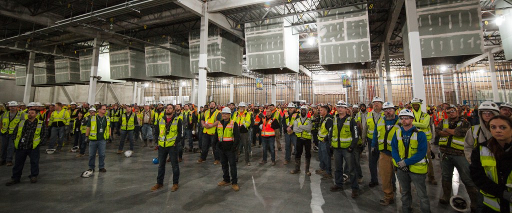 Construction workers inside data center building
