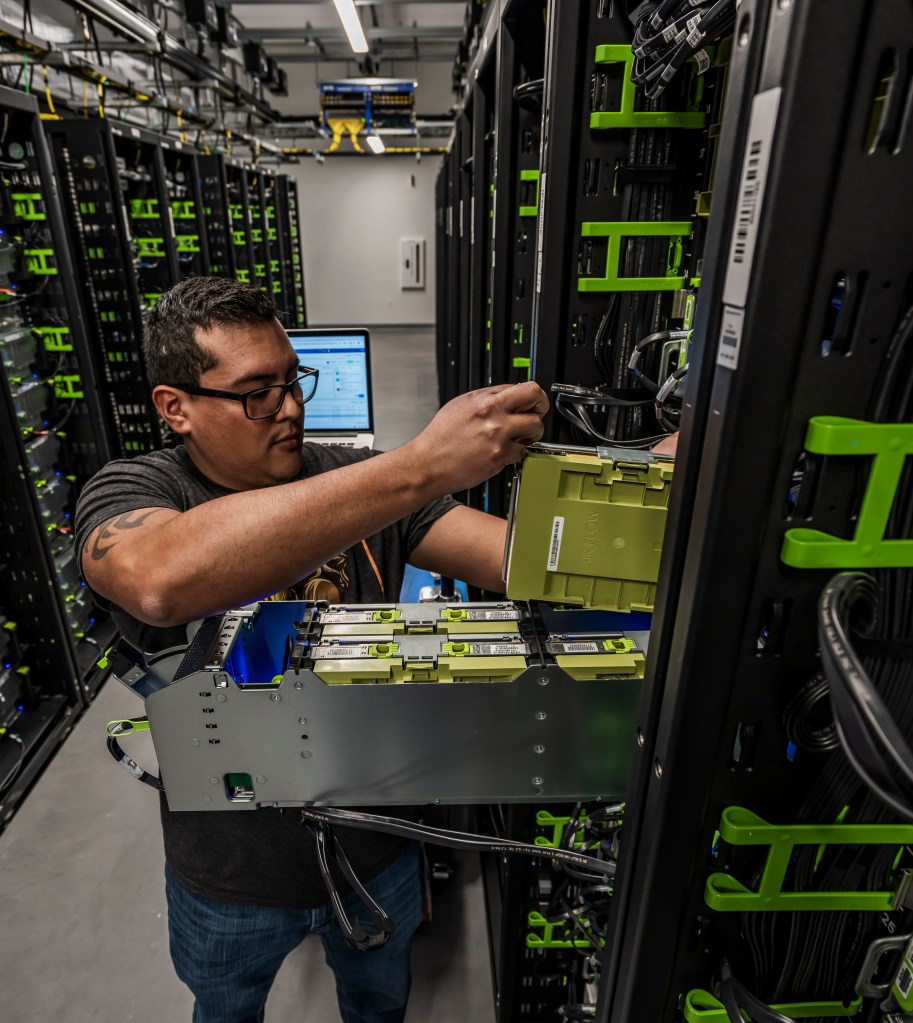 A person working in a data hall
