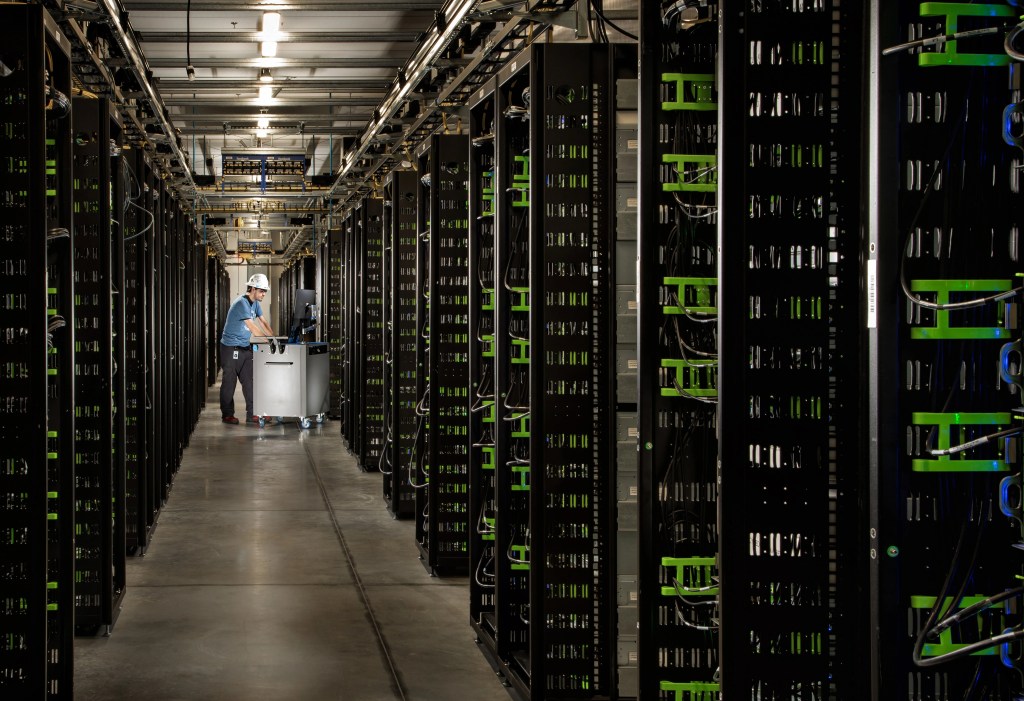A person working at a data center hall